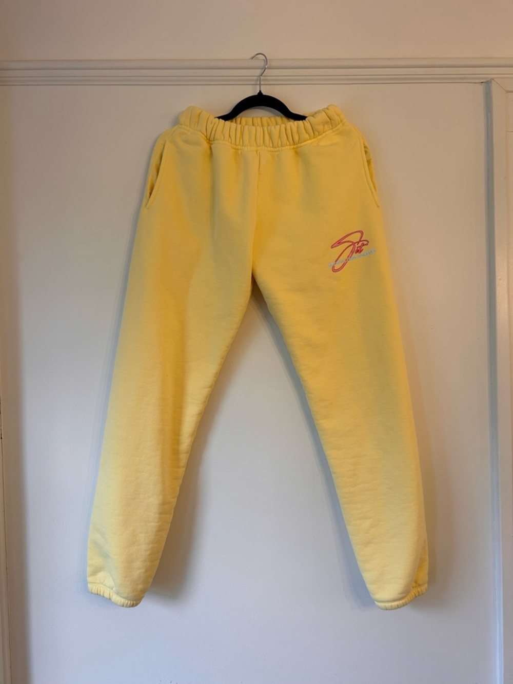SET Active Butter Yellow Track Pants with Pink Logo
